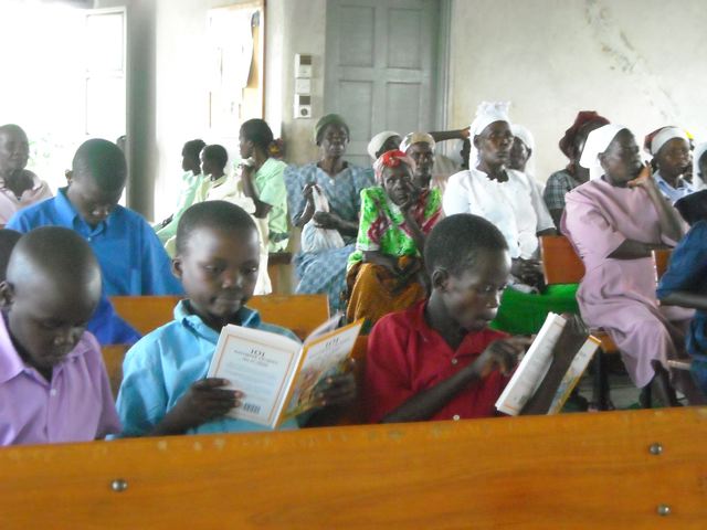 Orphans are thrilled to look at their new Christmas gift, a 101 Favorite Bible story book. Orphans are thrilled to look at their new Christmas gift, a 101 Favorite Bible story book.
