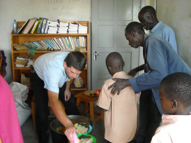 Each orphan and guardian is served a generous portion of meat, potatoes, vegetables, and ugali Each orphan and guardian is served a generous portion of meat, potatoes, vegetables, and ugali